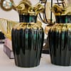 The gilded ceramic vase duo The Gilded Ceramic Vase